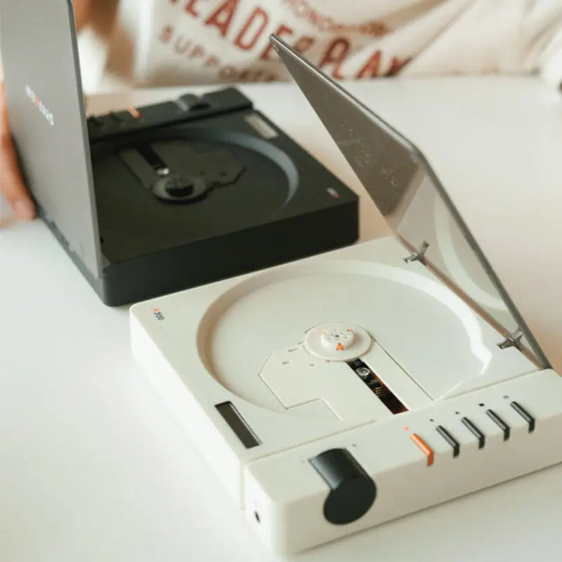 The Syitren R300 Portable Vintage CD Player features a Toslink optical output and Jack 3.5mm headphone output, delivering Hi-Fi audio so you can enjoy your CD collection on the go. It also has Bluetooth 5.3 transmission capabilities and can automatically pair with Bluetooth headphones or speakers.