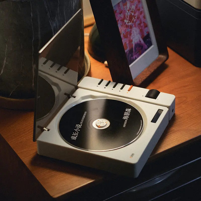 The Syitren R300 Portable Vintage CD Player features a Toslink optical output and Jack 3.5mm headphone output, delivering Hi-Fi audio so you can enjoy your CD collection on the go. It also has Bluetooth 5.3 transmission capabilities and can automatically pair with Bluetooth headphones or speakers.