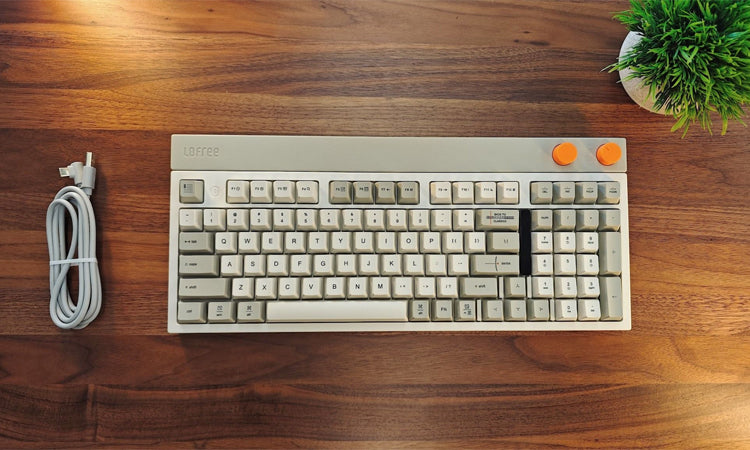 LOFREE BLOCK retro wireless mechanical keyboard features self-lubricating POM switches and hot-swappable switches. It has two knobs for volume and mode, enhancing its vibrant design.