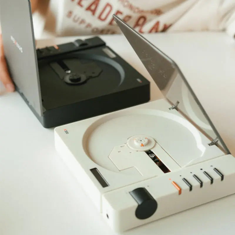  The Syitren R300 Portable Vintage CD Player features a Toslink optical output and Jack 3.5mm headphone output, delivering Hi-Fi audio so you can enjoy your CD collection on the go. It also has Bluetooth 5.3 transmission capabilities and can automatically pair with Bluetooth headphones or speakers.